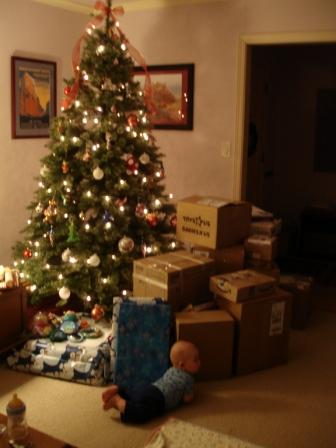 christmastreepackedwithpresents.jpg